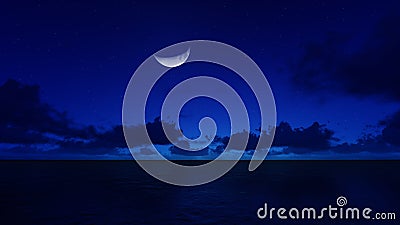 A crescent moon in the night over the ocean Stock Photo