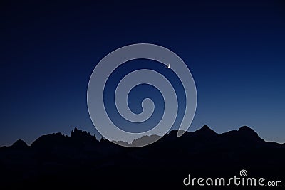 Crescent Moon Setting Over The Minarets Stock Photo