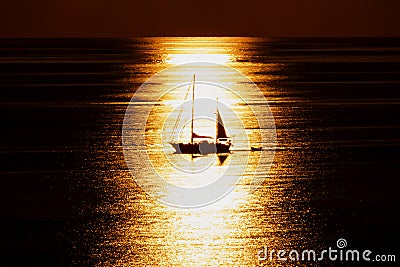 Sailboat at Sunset on Half moon bay beach on Ponza Island in Italy Stock Photo