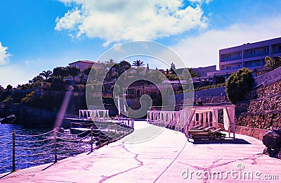 Crete Greece : Wide angle shot of a luxurious bed for rest and tan under sun with curtains. Luxury holidays Stock Photo