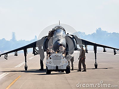 Crews retrieve Harrier fighter jet Editorial Stock Photo