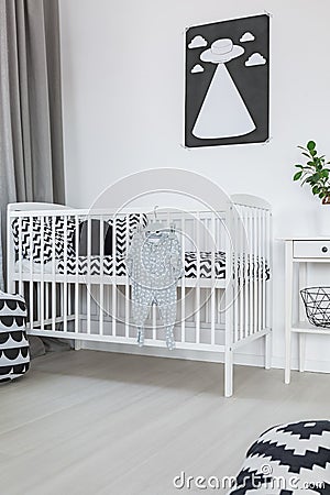 Crib in baby room Stock Photo