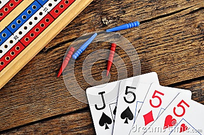 Cribbage board and playing cards Stock Photo