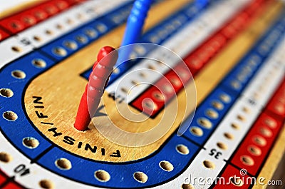 Cribbage board and playing cards Stock Photo