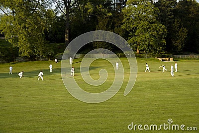 Cricket match on a summer evening ashford in the water peak dist Stock Photo
