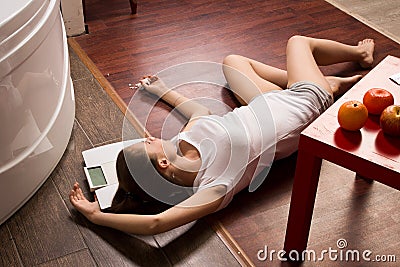 Crime Scene Simulation. Overdosed Girl Lying On The Floor 