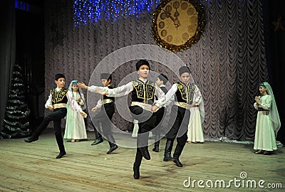 Crimean tartar children dancers in native dress performing native dance on stage Editorial Stock Photo