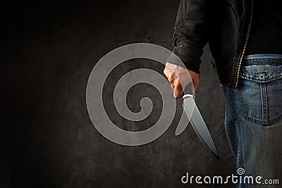 Criminal with large sharp knife Stock Photo