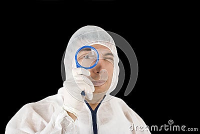 Criminologist with magnifier Stock Photo