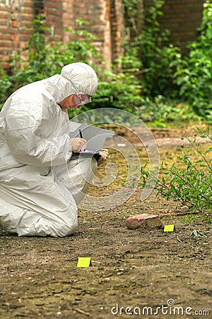 Criminologist makes short notices Stock Photo