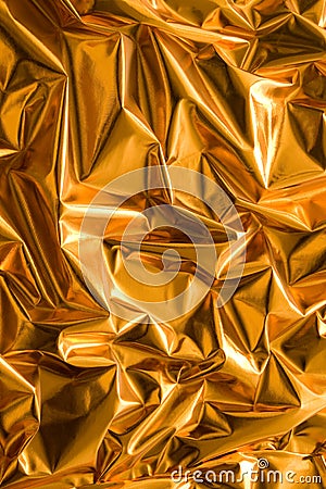 Crinkled gold paper Stock Photo