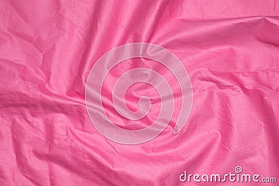 Crinkled pink material texture or background Stock Photo