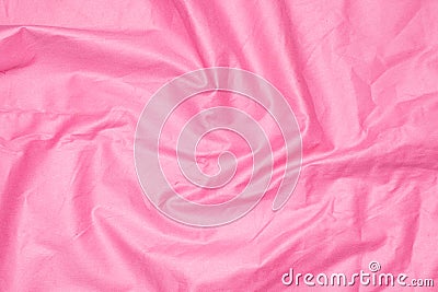 Crinkled pink material texture or background Stock Photo