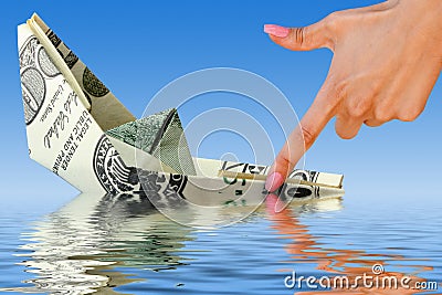 Crisis. money ship in water Stock Photo