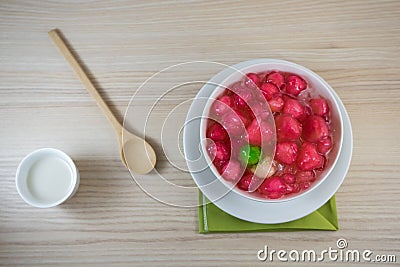 Crisp pomegranate seeds is Thai sweetmeat on the table Stock Photo