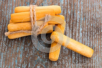 Crispy bread sticks on wooden table background Stock Photo