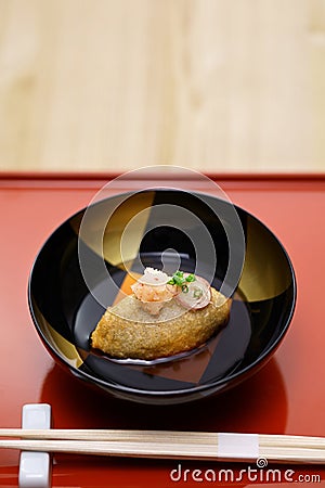 crispy fried buckwheat dumpling with dashi-based sauce. Japanese soba cuisine Stock Photo