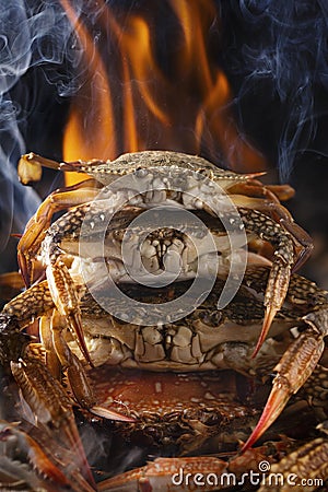 Crispy grilled crabs are looking at you before you eat them lol Stock Photo