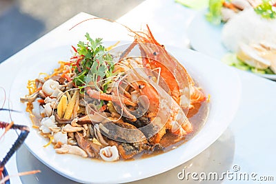 Crispy noodles mix sea food in dish Stock Photo