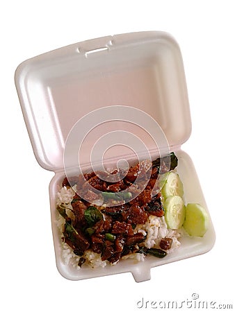 Crispy pork with Basil fried rice in foam box on white background Stock Photo