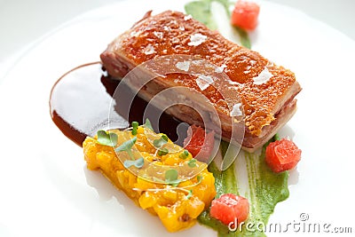 Crispy pork fillet with mango chutney. Stock Photo