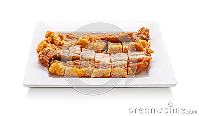 Crispy pork slice on dish isolated on white background Stock Photo