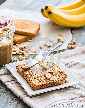 Crispy toast with peanut butter, bananas, breakfast Stock Photo