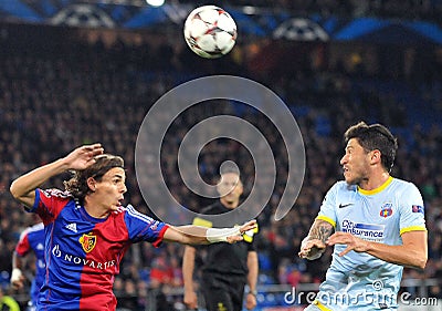 Cristian Tanase and Kay Voser pictured during UEFA Champions League game Editorial Stock Photo