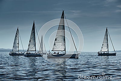 Croatia, Adriatic Sea, 15 September 2019: The race of sailboats, a regatta, reflection of sails on water, Intense Editorial Stock Photo