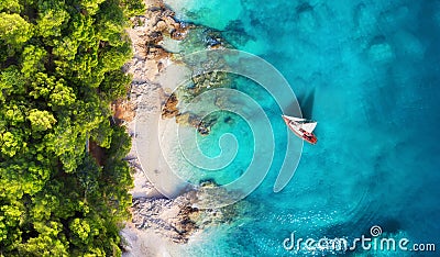 Croatia. Panoramic coast and yacht as a background from top view. Turquoise water background from top view. Beach and waves. Stock Photo