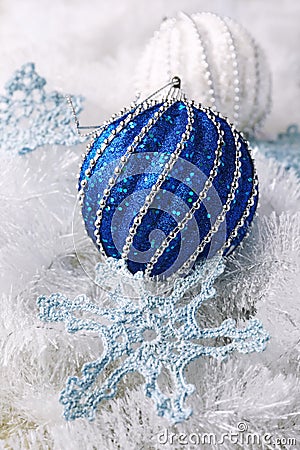 Crochet snowflake and two large Christmas balls Stock Photo