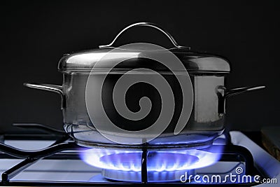 Crock on the gas stove Stock Photo