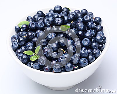 Crockery with blueberries. Stock Photo