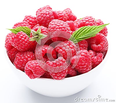 Crockery with raspberries. Stock Photo