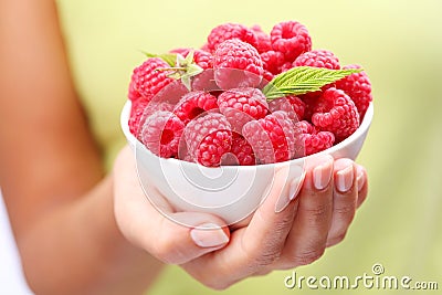 Crockery with raspberries Stock Photo