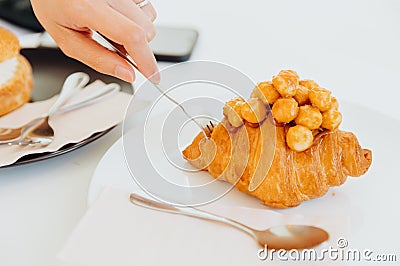 Croissant with Macadamia topping luxury bakery looking tasty delicious Stock Photo