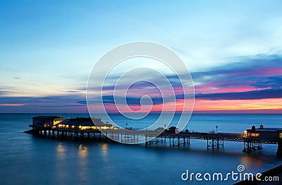 Cromer pier at sunrise on english coast Stock Photo