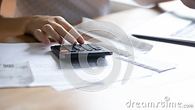 Close up of woman calculate managing household finances Stock Photo