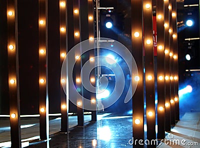 Colourful lighting on contemporary fashion show cat walk Stock Photo