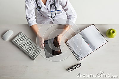 Crop doctor at desktop Stock Photo