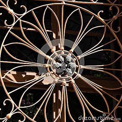 Crop view of architecture detail - antique wrought iron window Stock Photo