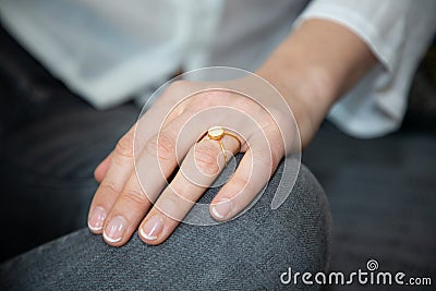 Crop woman hands with rings on finger Stock Photo