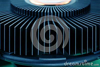 Cropped computer CPU cooling fan radiator toned turquoise blue green. Desktop maintenance and repair. Modern PC hardware Stock Photo