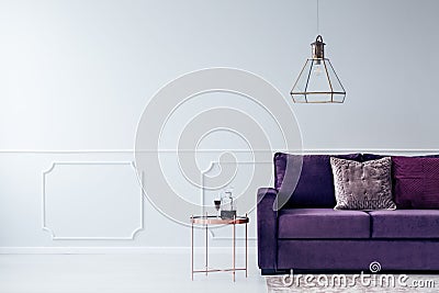 Cropped couch and chandelier Stock Photo