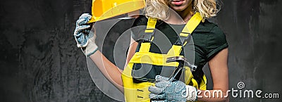 Cropped horizontal image builder woman with protective helmet Stock Photo