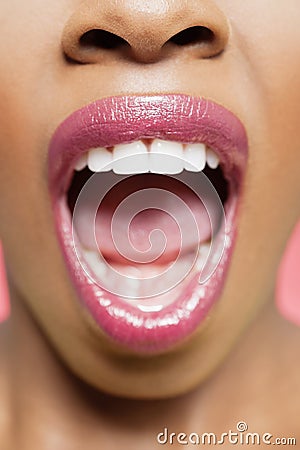 Cropped image of African American woman with mouth open Stock Photo