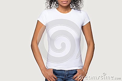 Cropped image african female wearing white t-shirt and jeans Stock Photo