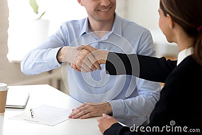 Diverse business partners starting negotiations shaking hands Stock Photo