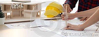 Cropped image of cooperative architect team work together. Closeup. Burgeoning. Stock Photo