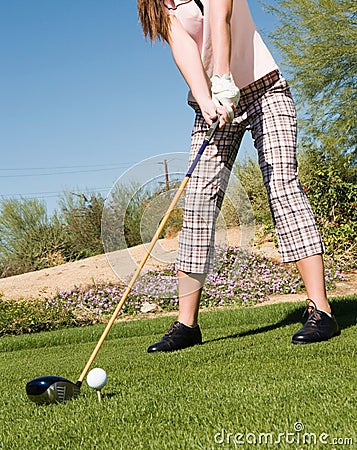 Cropped photo of Golfer Preparing for Shot Stock Photo